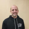 Brad is the owner of two successful companies: Frontier Homes Quinte, which specializes in both production and custom homes, and Rural Building Solutions, focused on constructing high-quality steel and wood structures such as shops and barns. A former Chair and long-time board member of the Quinte Home Builders’ Association (QHBA), Brad has always valued community involvement. Through volunteer work, sponsorships, and donations, both Frontier Homes and RBS have proudly supported local sports teams and tournaments over the years. Brad joined the Children’s Safety Village (CSV) Board around 2022, originally as a representative of the QHBA. However, their passion for the CSV’s mission quickly grew, recognizing its unique value in providing essential safety education. Brad is committed to helping the Village expand its reach and become a more visible and impactful resource in the community. Outside of work, Brad is a sports enthusiast who enjoys pickleball, swimming, and hockey. A proud parent of three boys and husband to a wonderful wife, he values a family-centered life and finds great joy in seeing his family—and others—thrive.